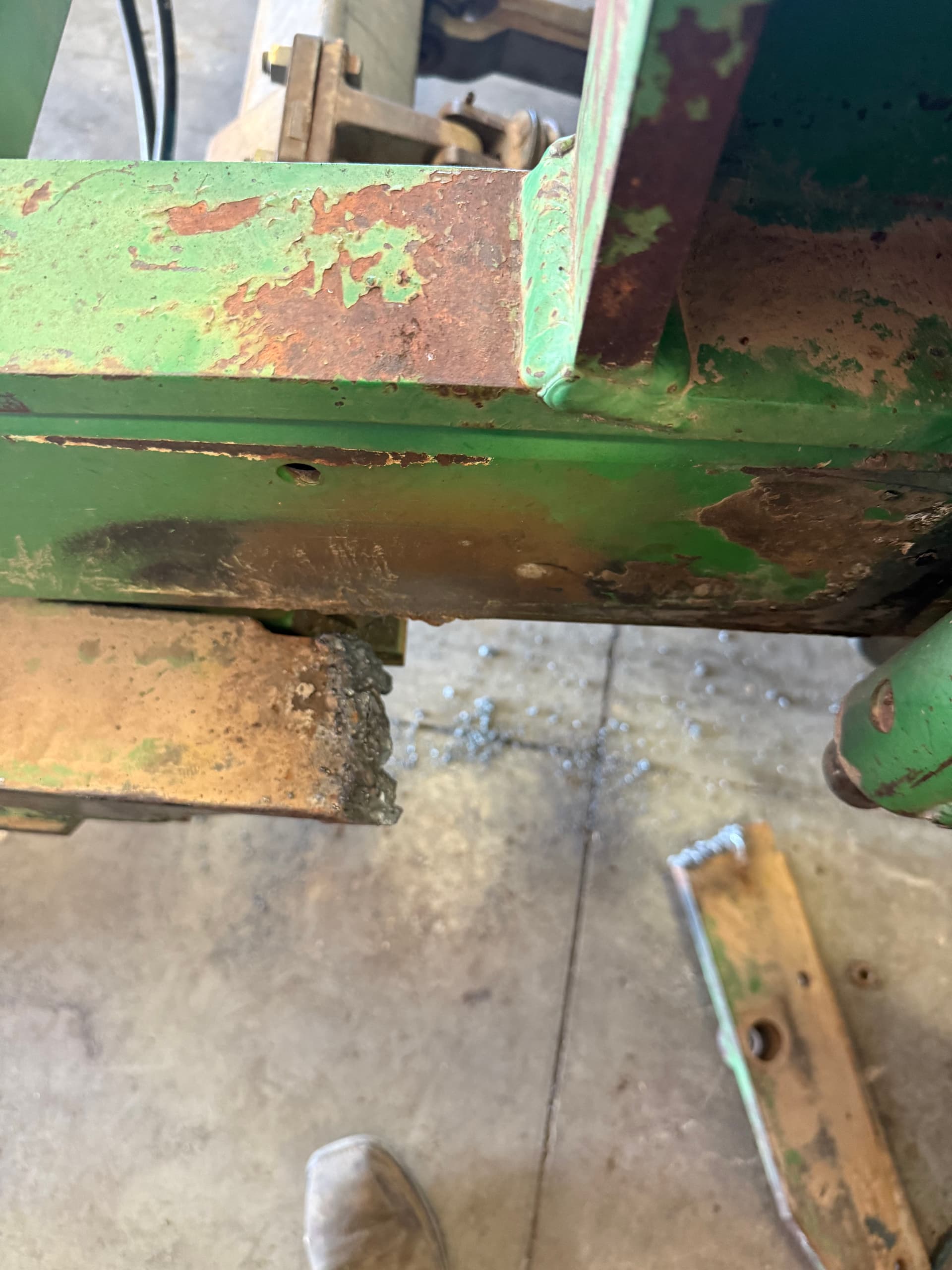 Gallery photos for Drill Tandem Hitch Repair and Reinforcement on a John Deere: Image #1