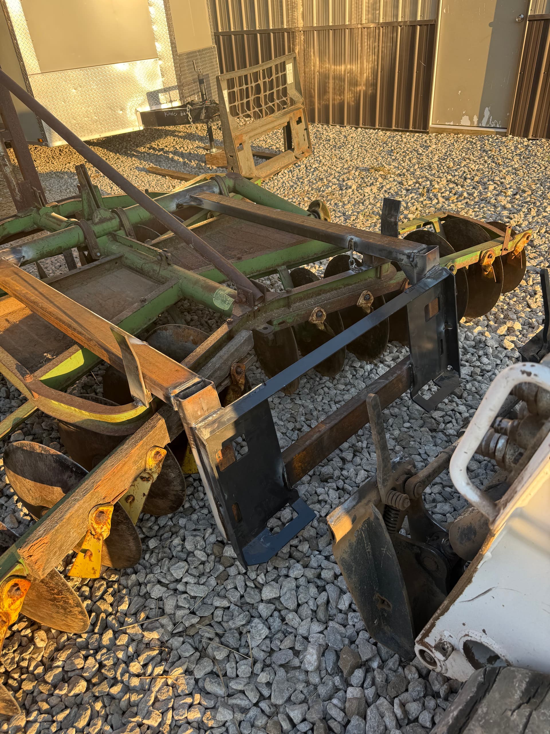 Custom Skid Steer Plate Welded onto a John Deere Disc image